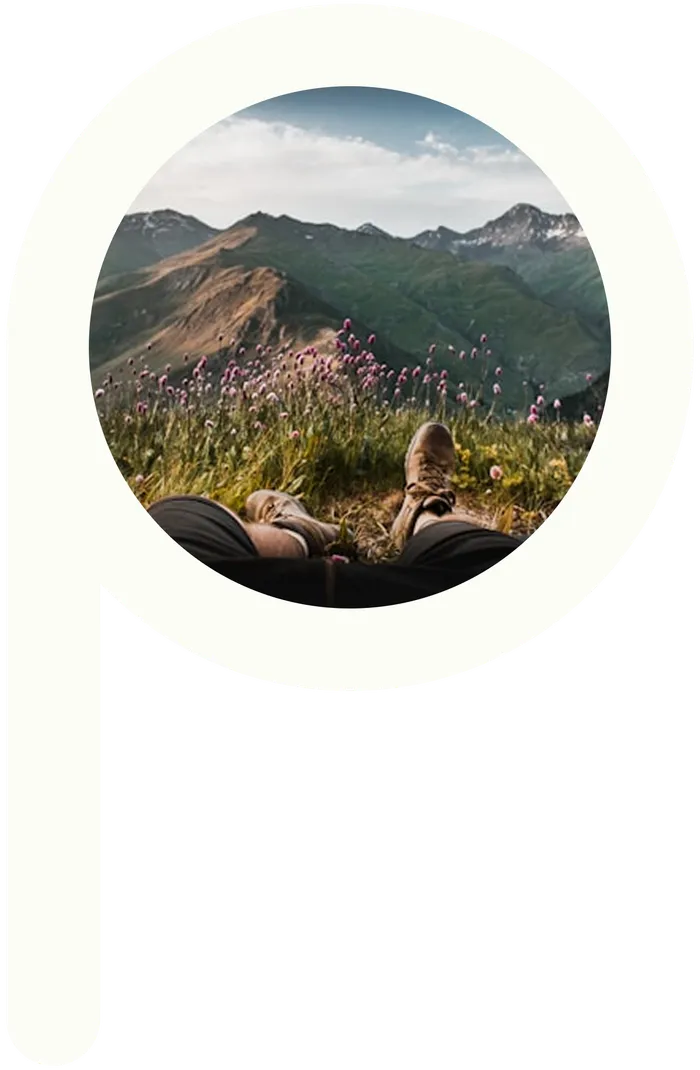 Traveler resting on a mountain trail, framed in the PirtTrip P